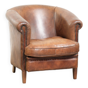 Fauteuil club en peau - look