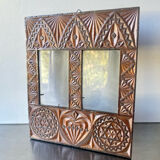 Double frame intricately carved wood