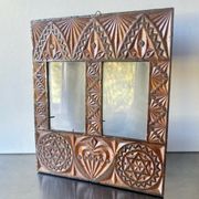 Double frame intricately carved wood