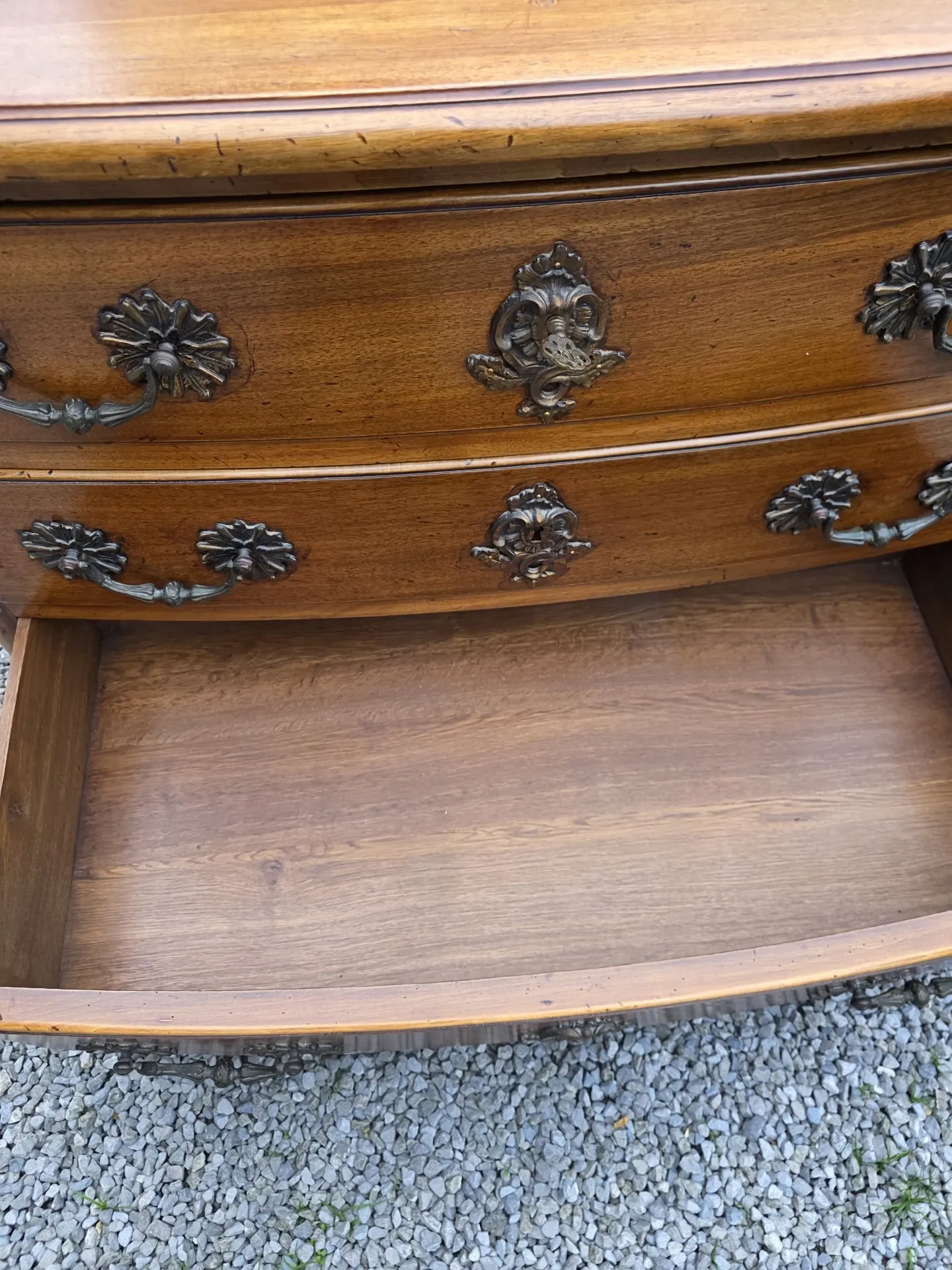 Curved Louis XV style chest of drawers in solid walnut