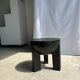 Black mango wood tripod side table with a semi-spherical top, height: 45 cm, diameter: 44 cm.