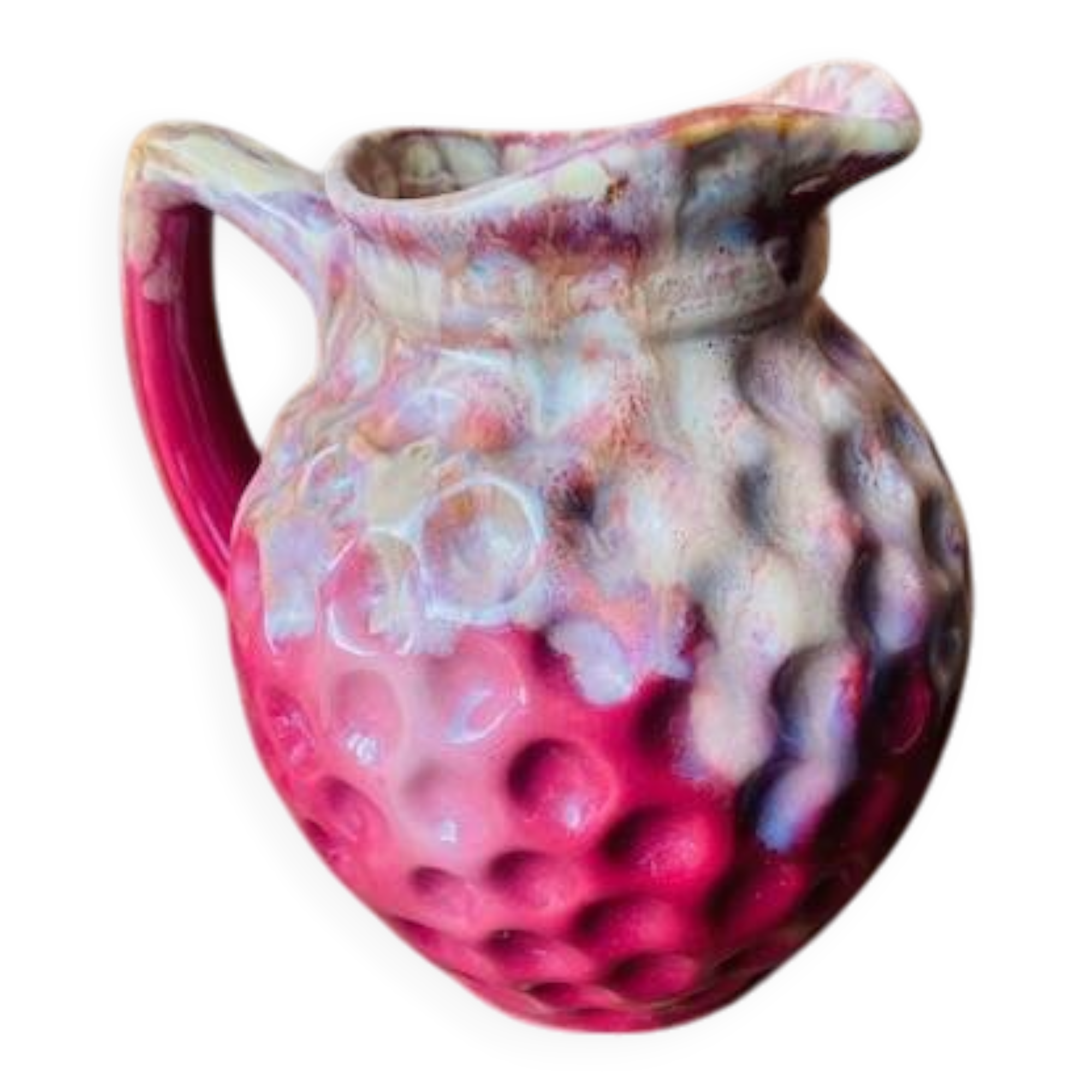Old pitcher in burgundy ceramic