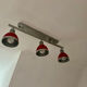 Designer pendant light with 3 red and chrome spots