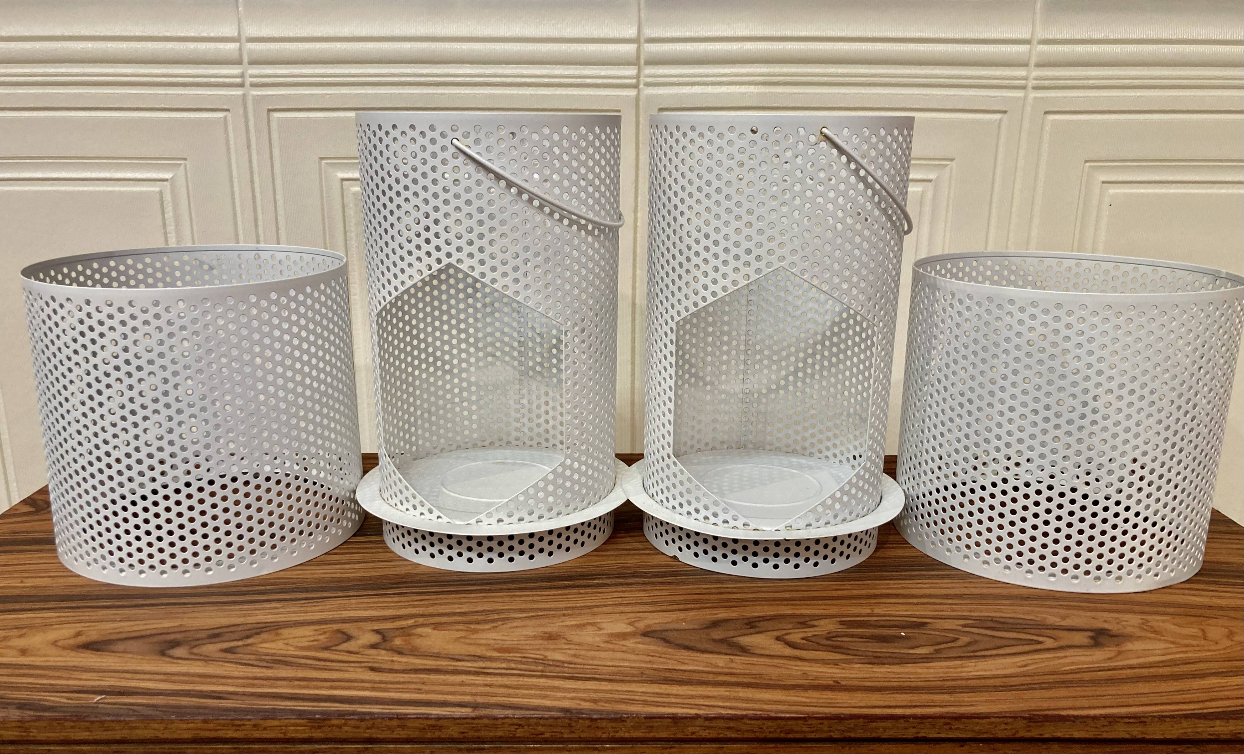 Set of 2 large metal candle holders in scandinavian design.