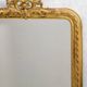 Louis-Philippe mirror from the 19th century with a ribbon trompe-l'œil frame.