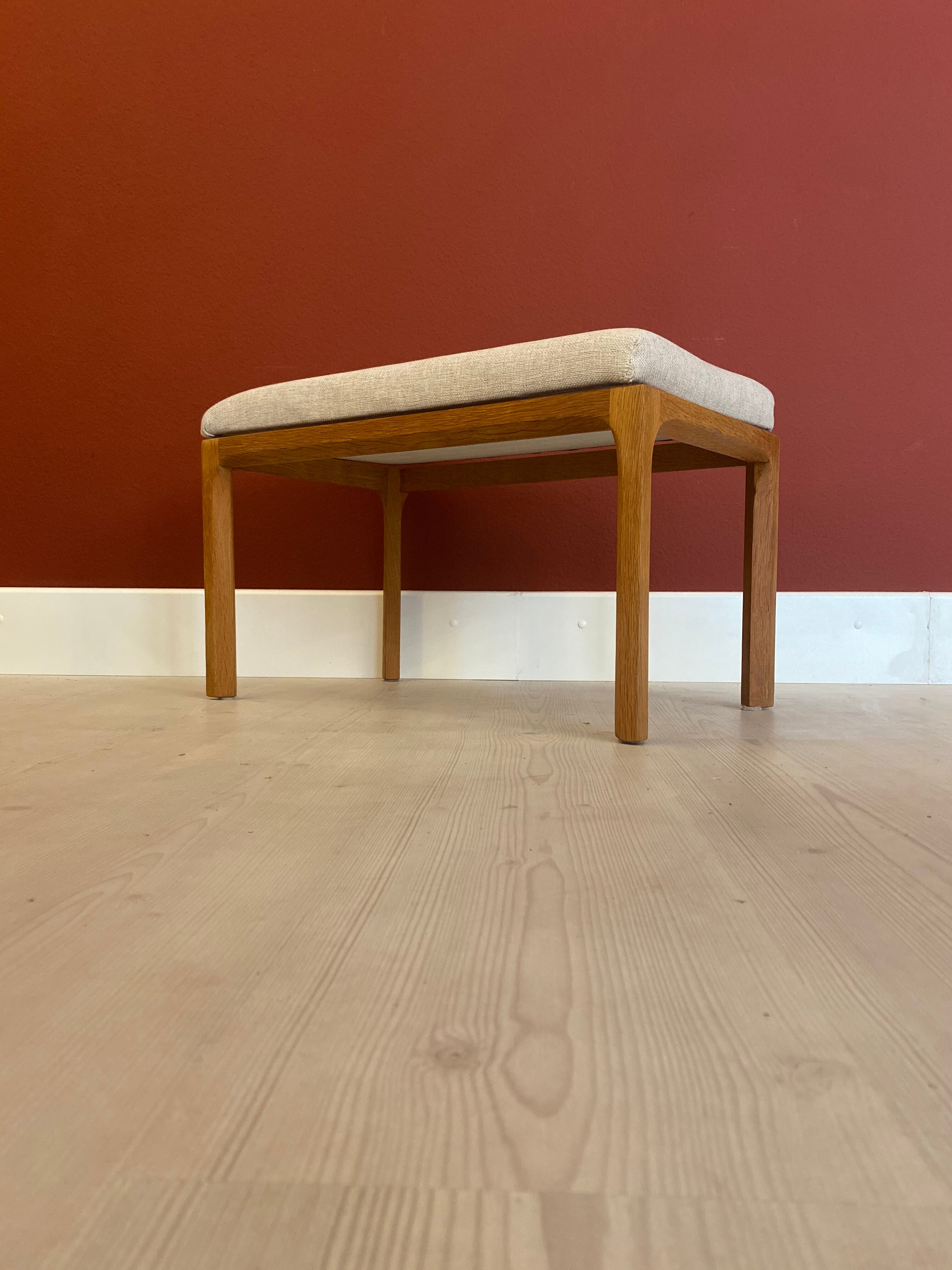 Danish ottoman in oak by Kai Kristiansen