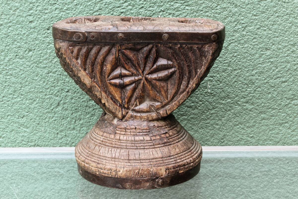 Brutalist candlestick, antique Asian grain sorter in carved wood.