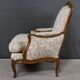 Queen's bergère in carved beech, Louis XV period – mid 18th century