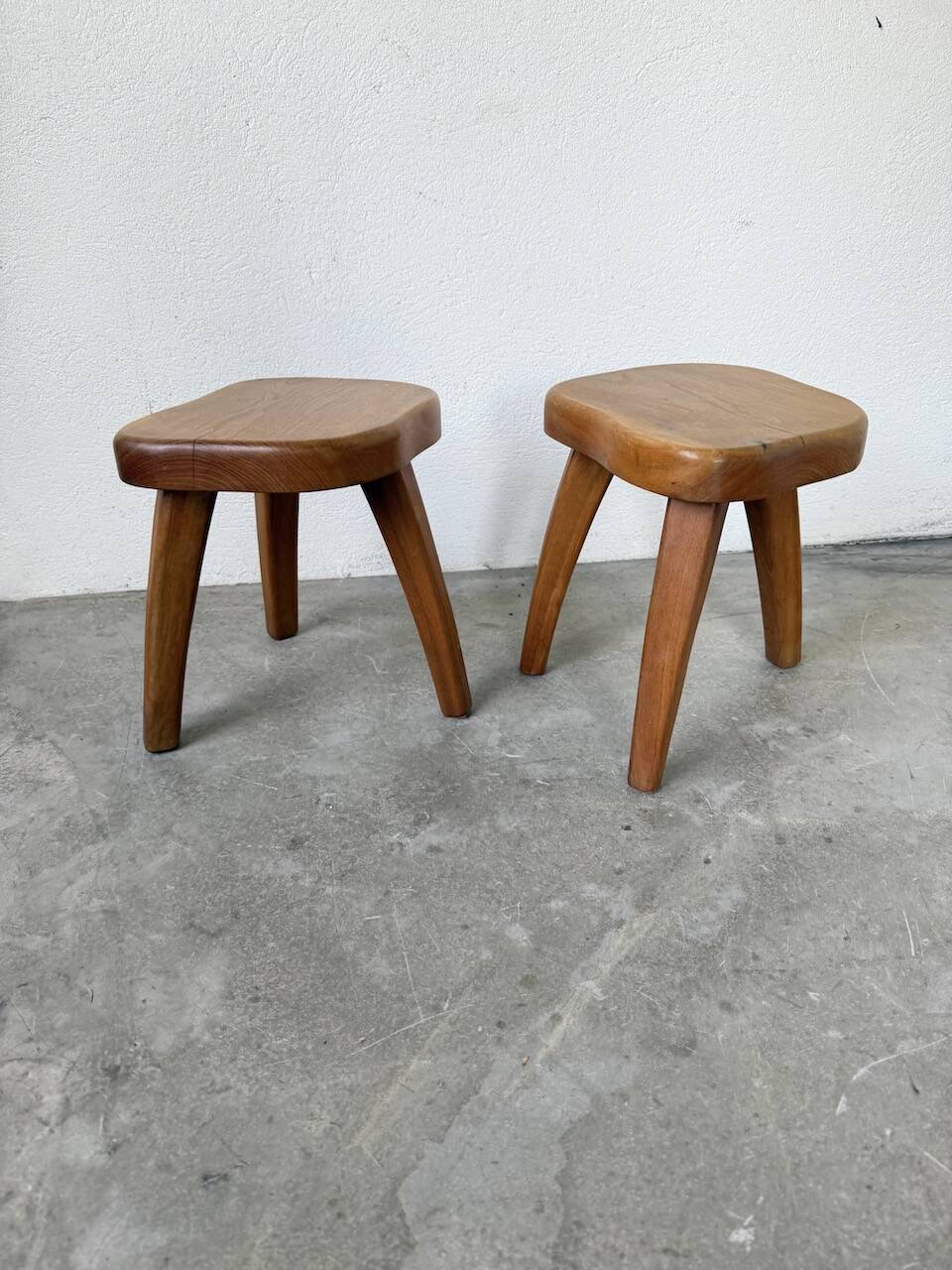 Pair of Henri Bataille oak stools