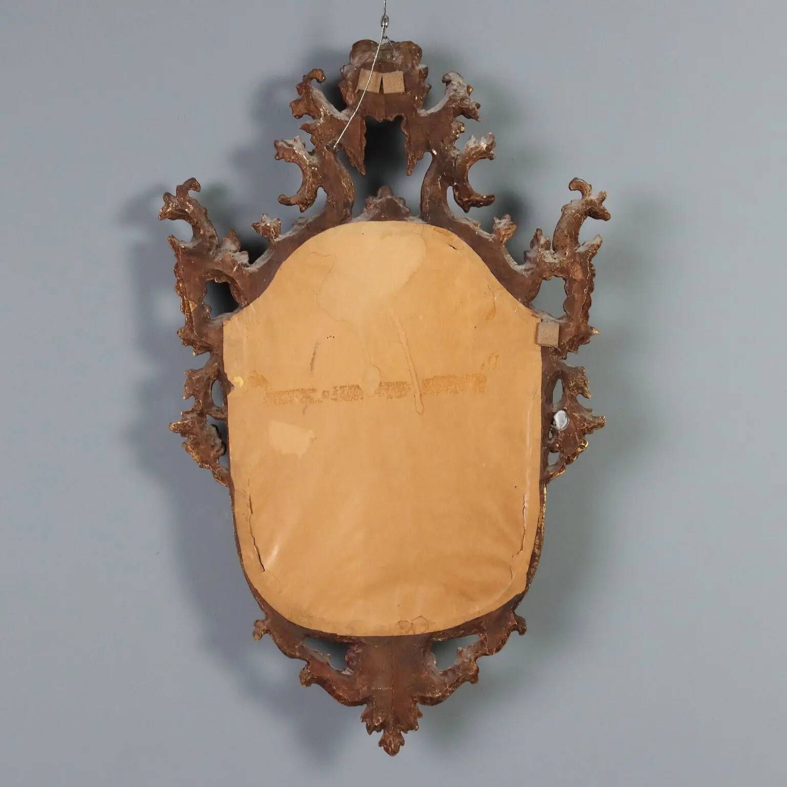 Antique carved and gilded wooden mirror, Italy, late 19th century.