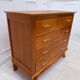 Vintage chest of drawers with tapered legs