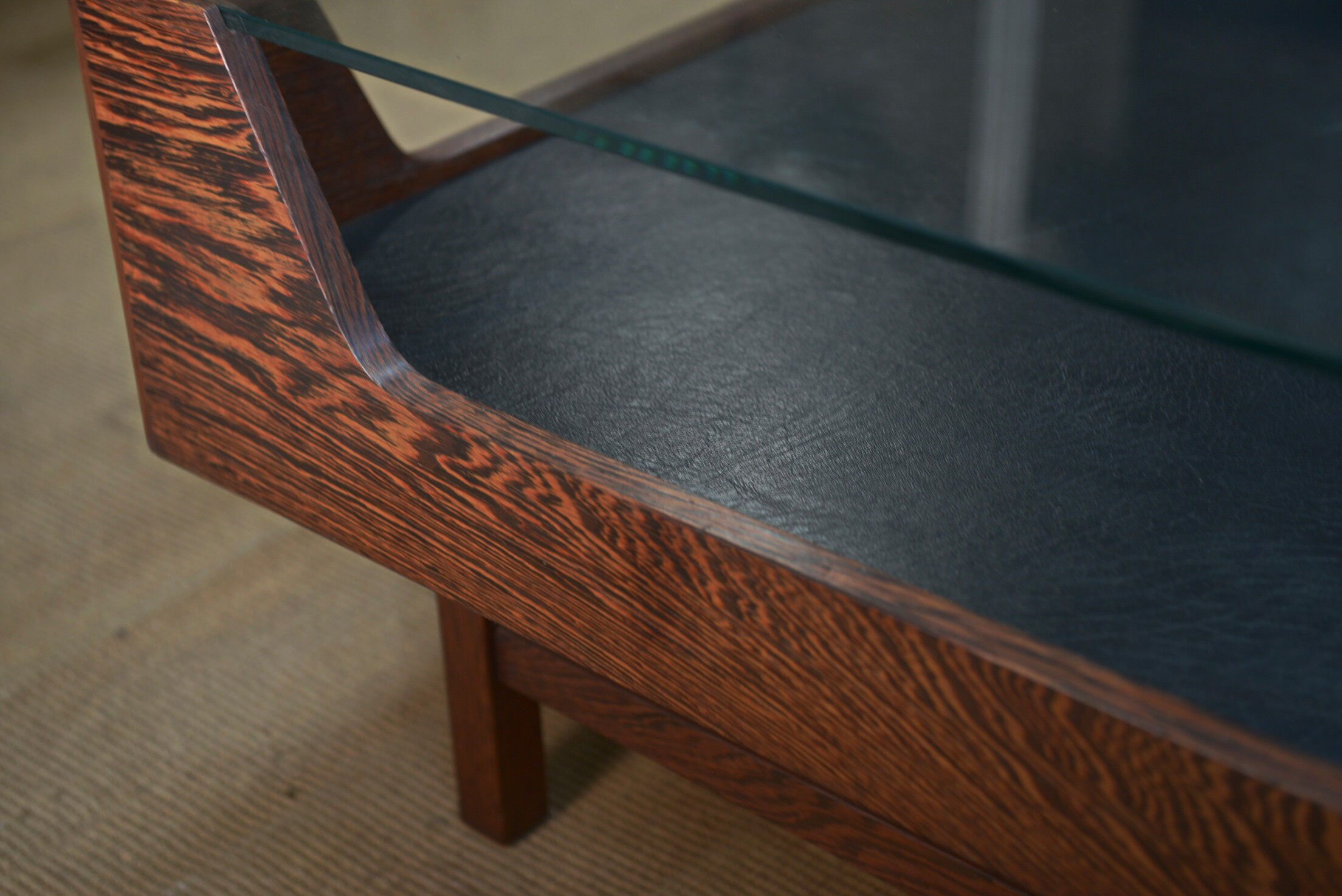 Coffee table in rosewood and glass 1970