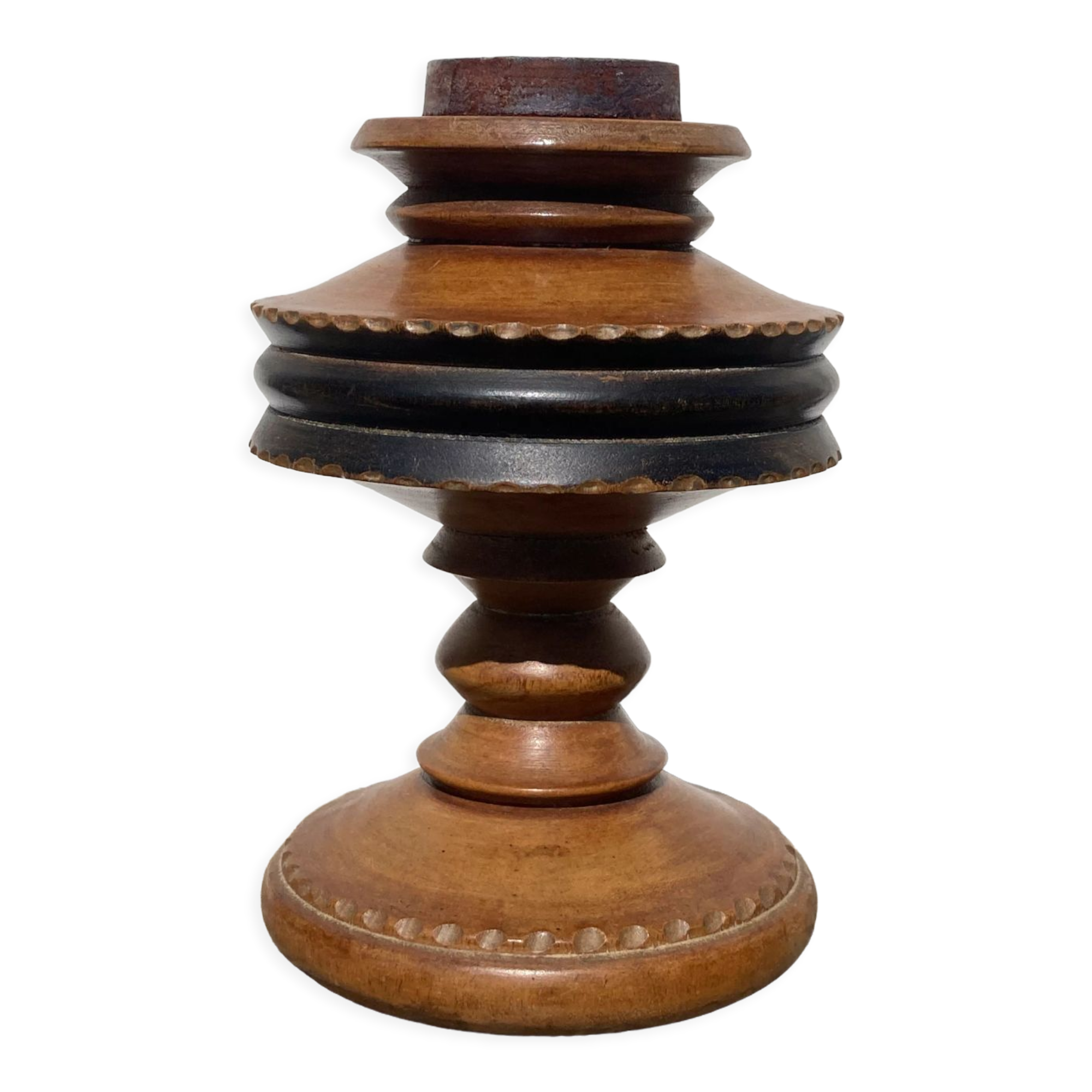 Foot of turned wooden lamp and carved