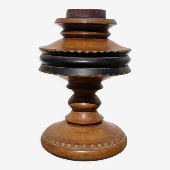 Foot of turned wooden lamp and carved