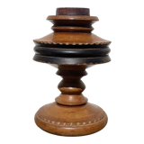Foot of turned wooden lamp and carved