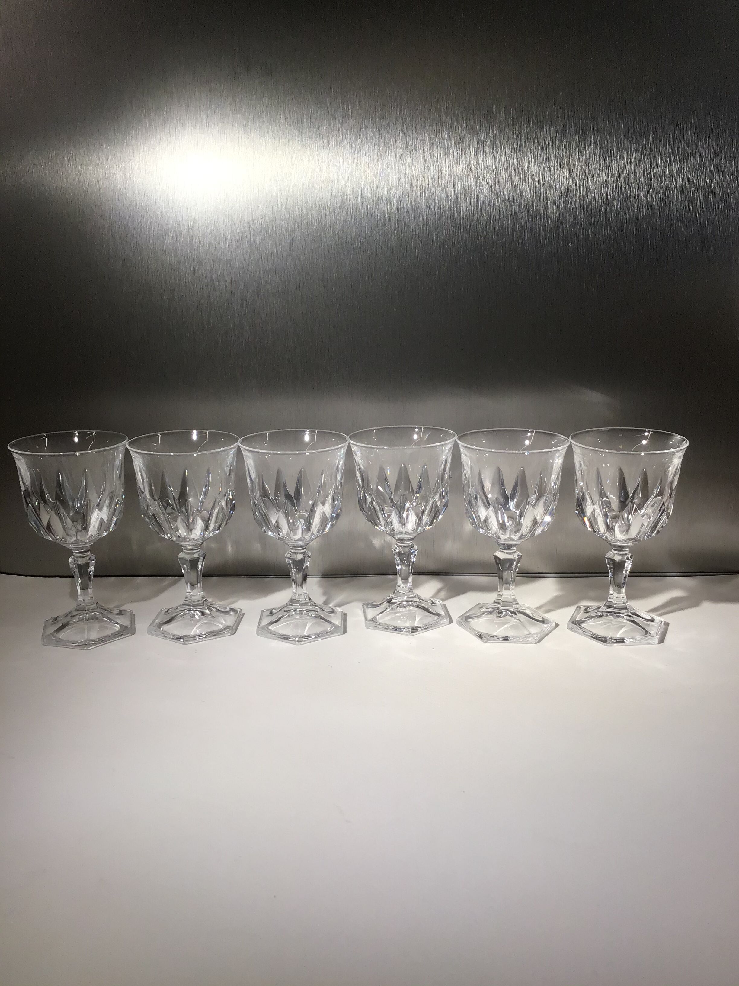 Lot of 6 crystal digestive glasses cut to octagonal feet early 20th century