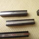 Set of 12 wooden and metal art deco style knife carriers