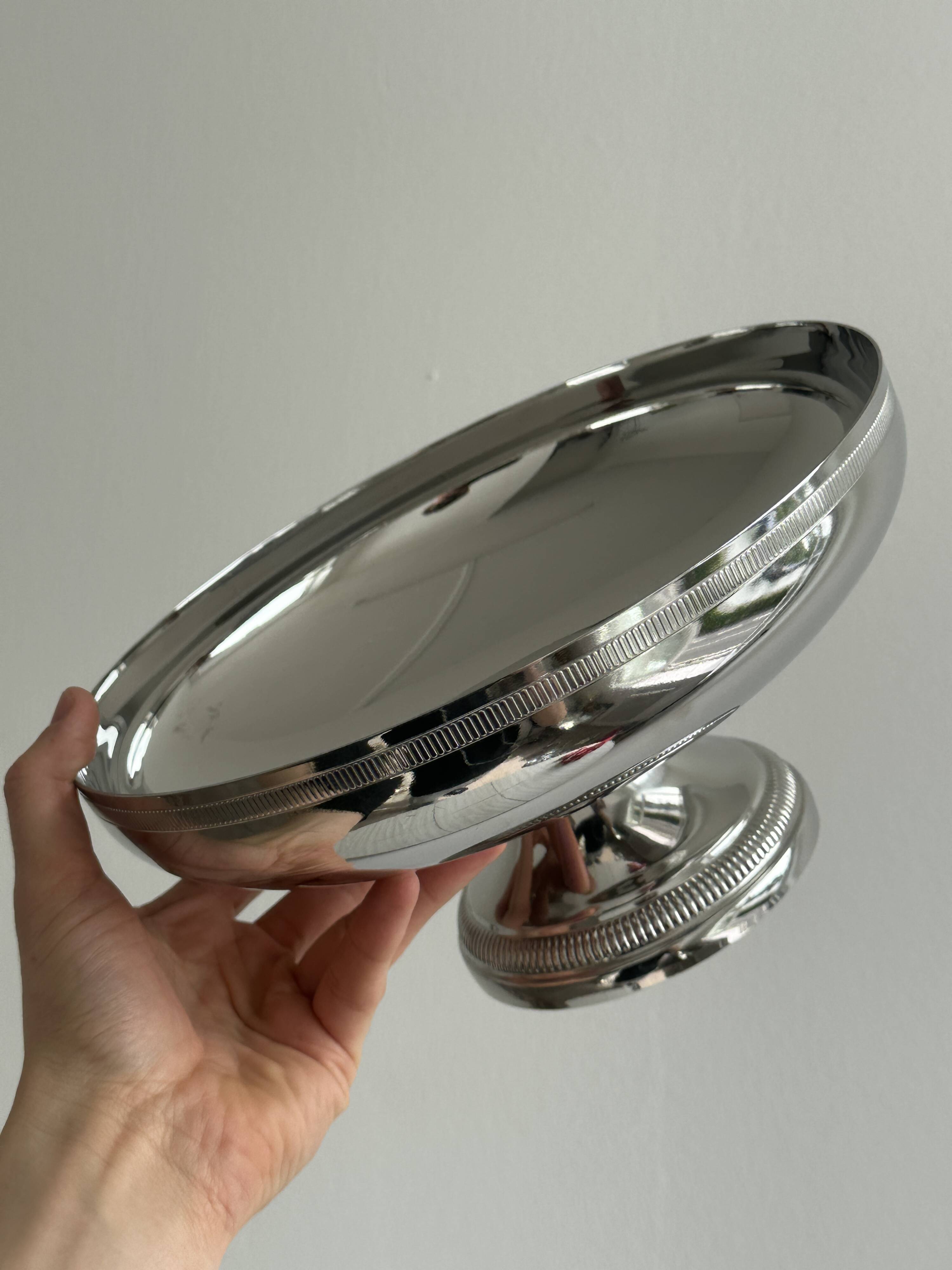 Large silver stainless steel pedestal bowl