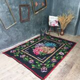 Vintage wool rug with floral design in sweet colors