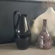 Black glazed ceramic pitcher signed M Azouit