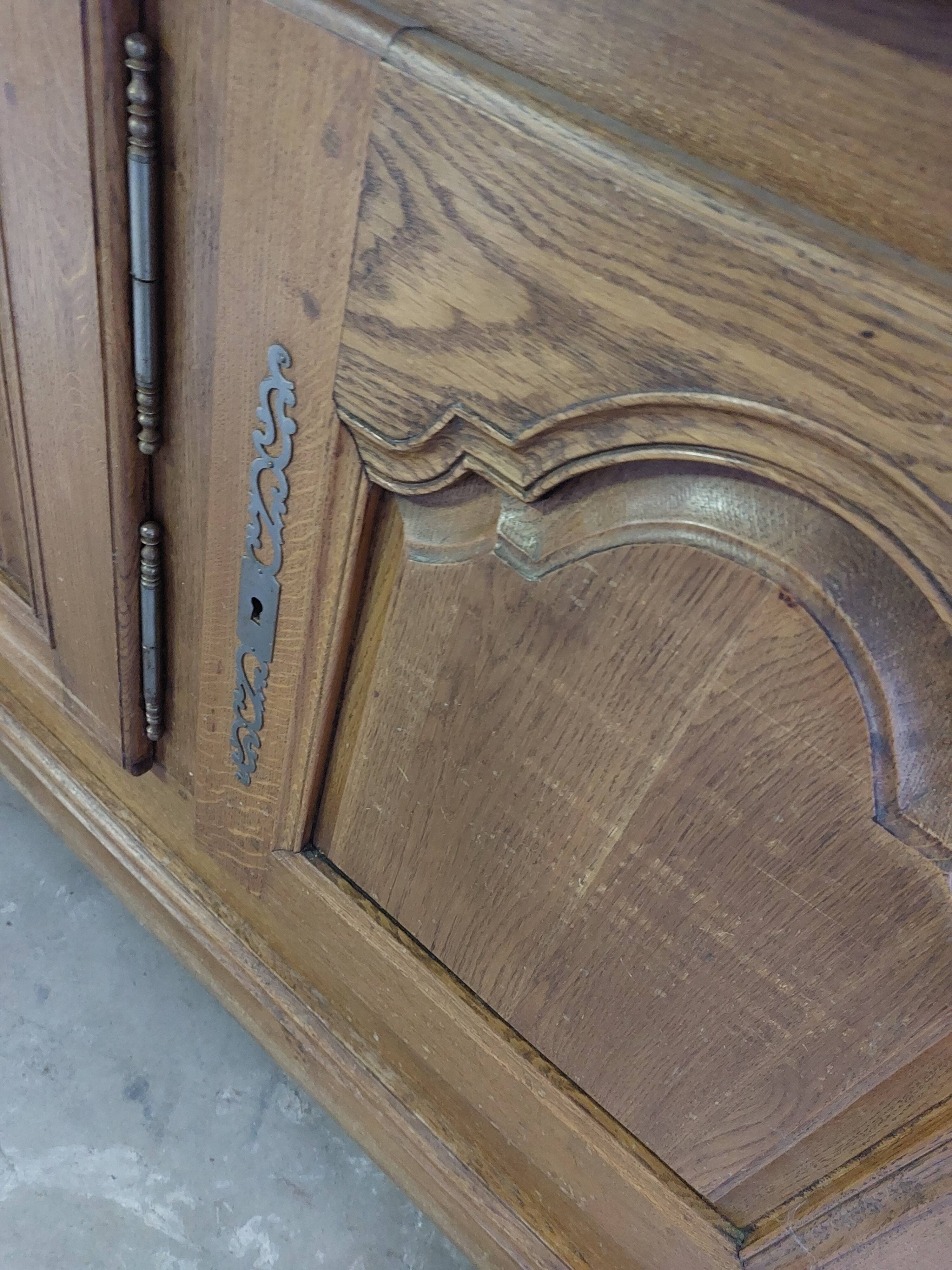 Showcase library with two sections in solid oak.