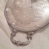 Very large quadripod oval serving tray in rococco style/silver metal