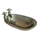 Old soap dish in the shape of a brass bathtub