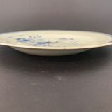 Blue and white porcelain plate of the blue family, 19th century