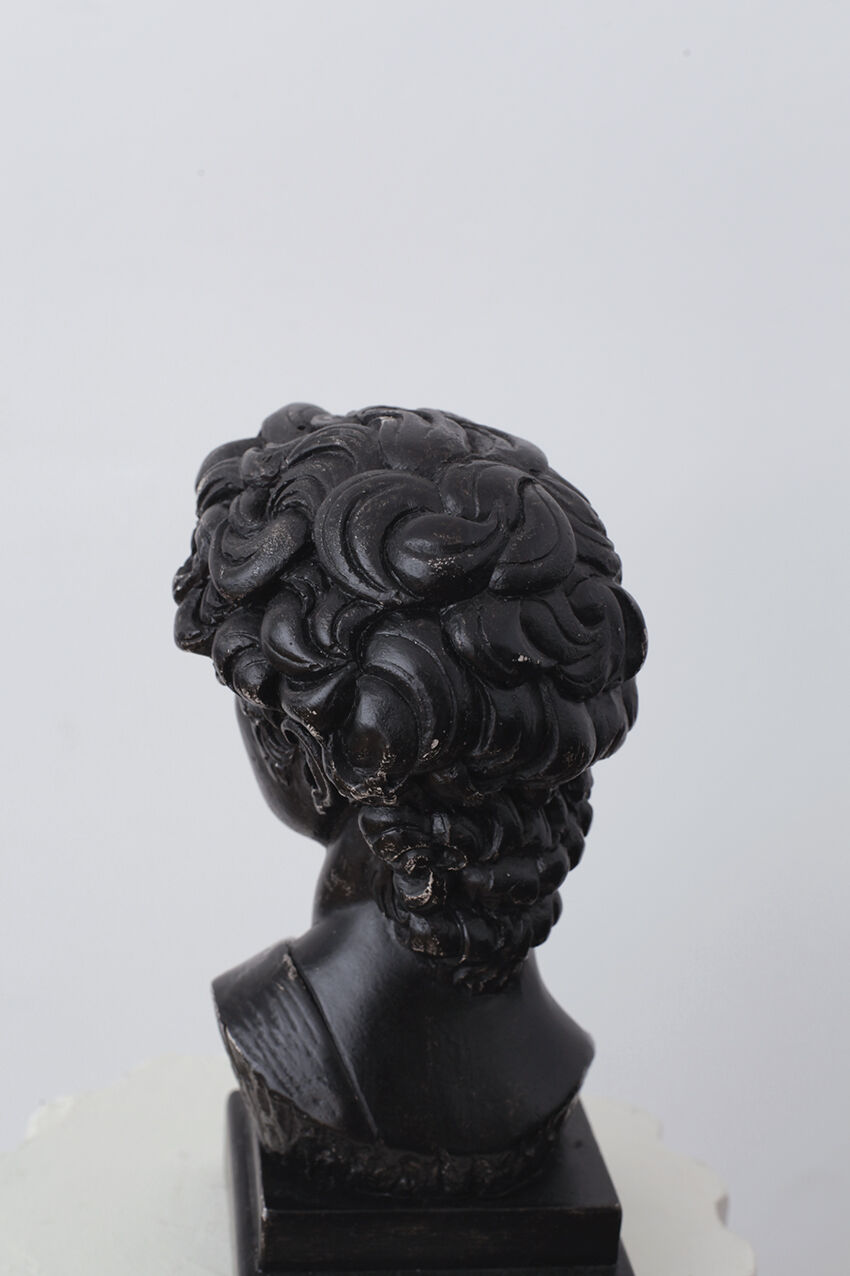 David head in black waxed plaster