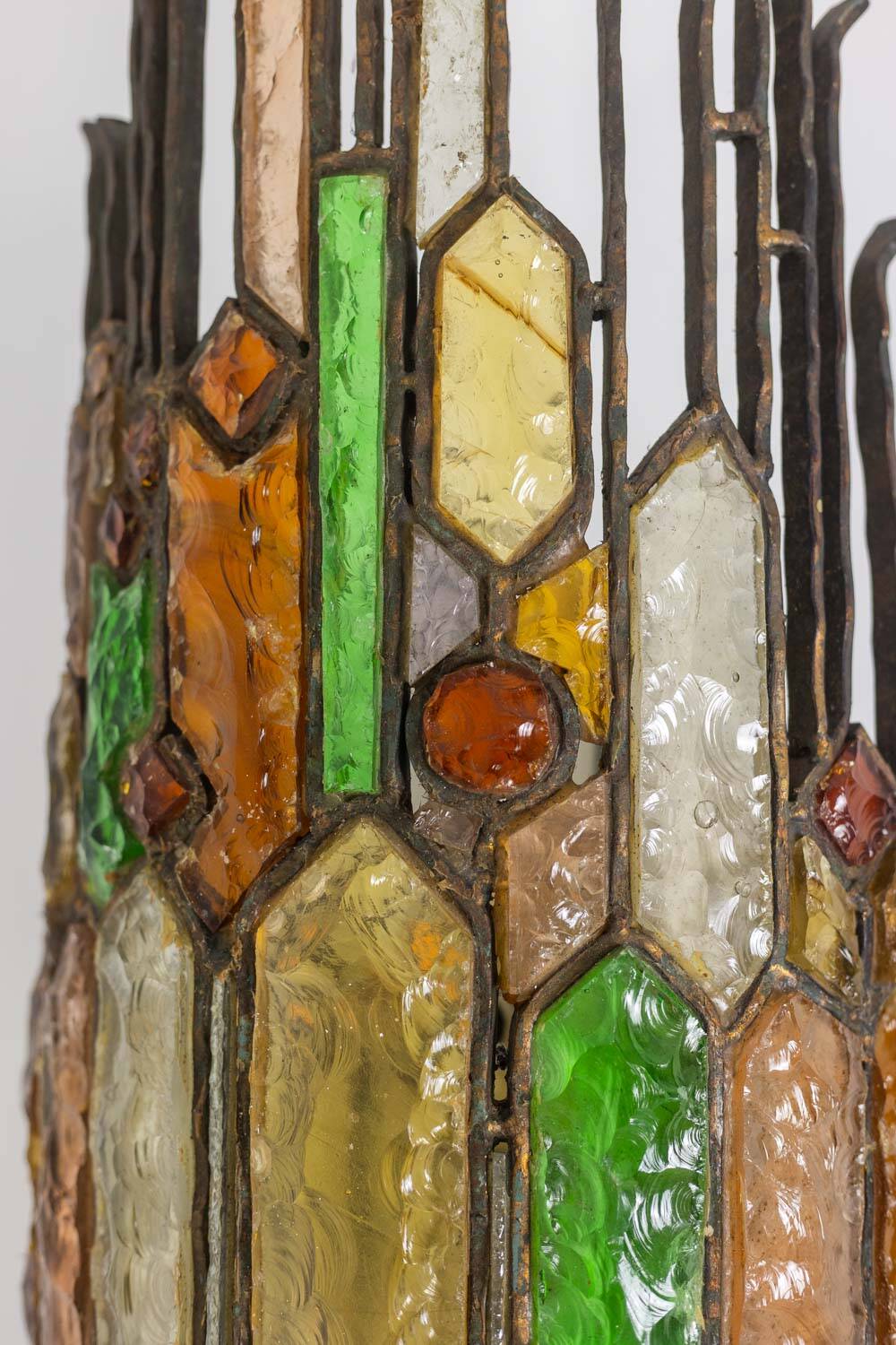 Wrought iron and colored glass wall light. 1960s.