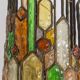 Wrought iron and colored glass wall light. 1960s.