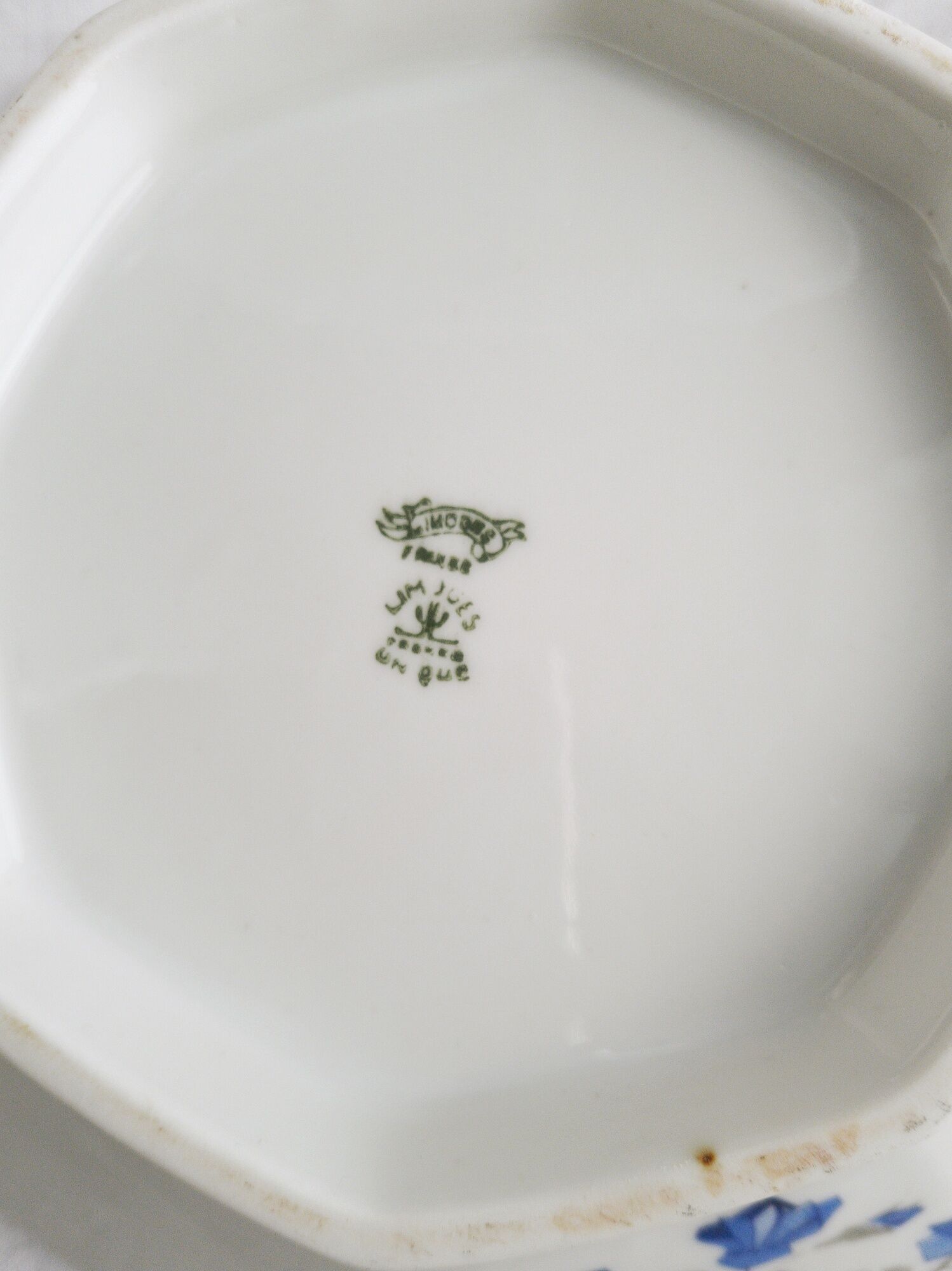 Old porcelain hollow dish of Limoges blue flowers
