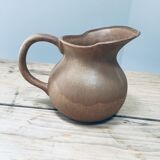 Pitcher in old sandstone