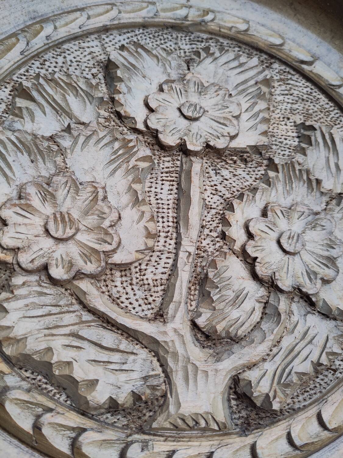 Round carved wooden dish