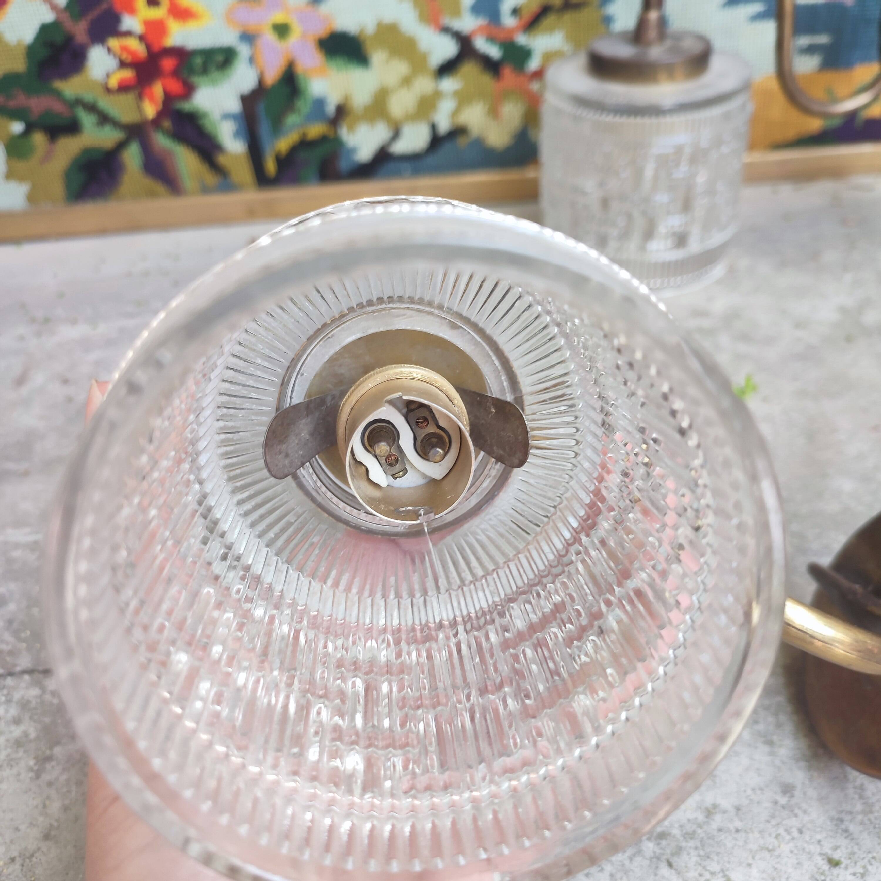 Pair of cylindrical tulip wall lights from the 1950s.