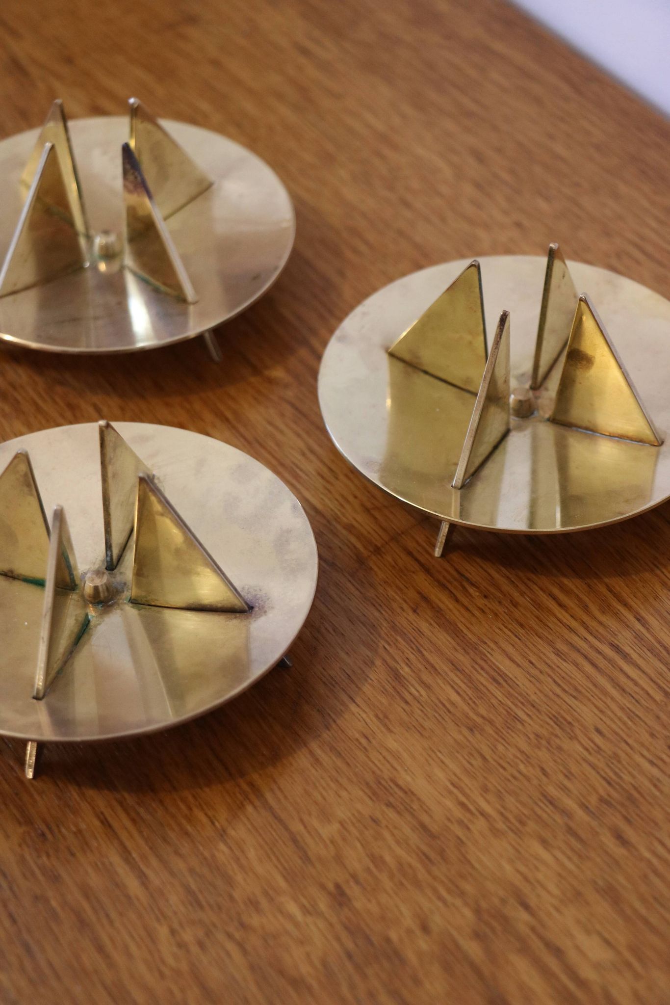 Scandinavian trio of candlesticks in brass by Pierre Forsell for Skultuna.