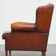 Fauteuil à oreilles en cuir de mouton