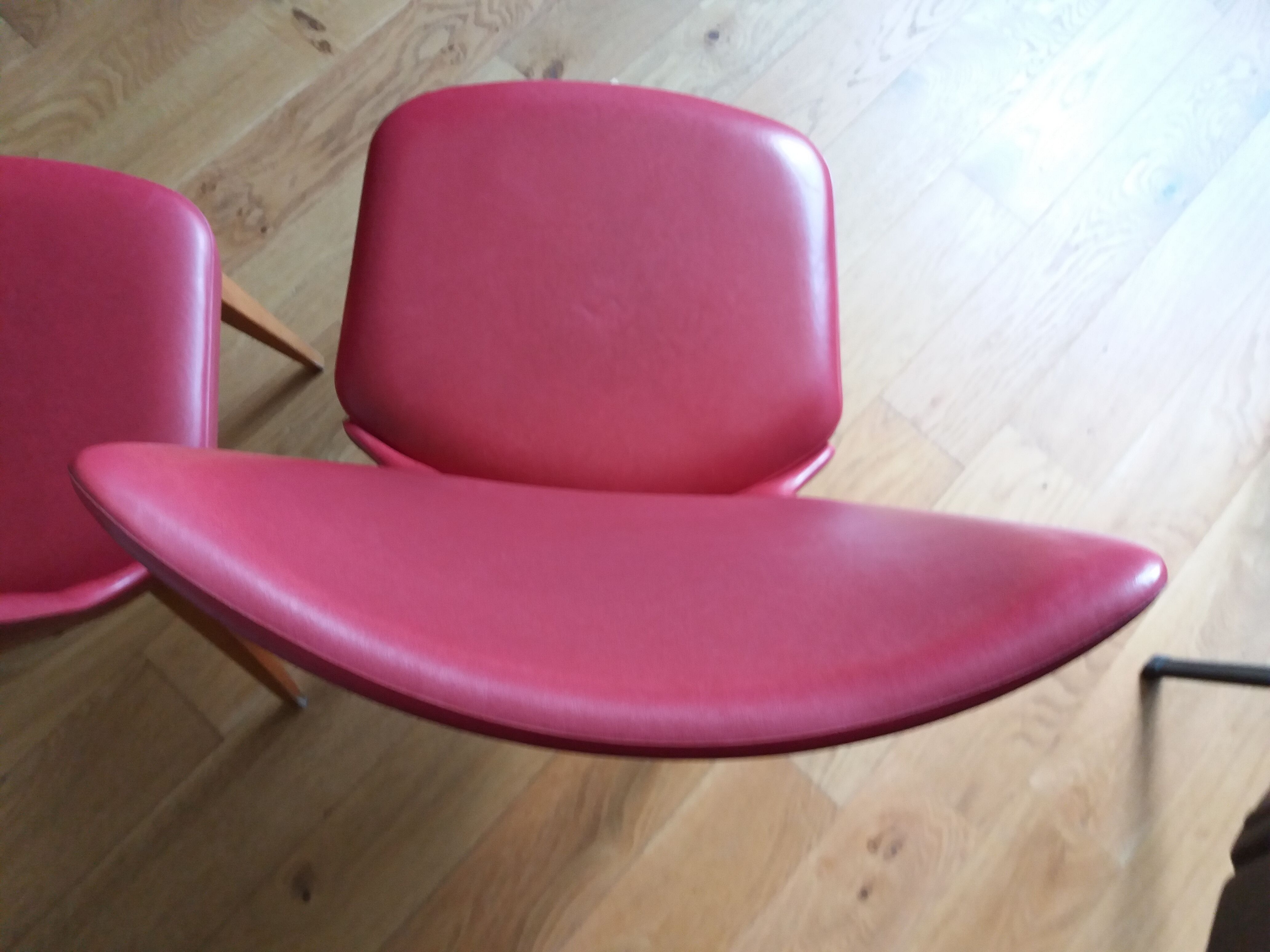 Baumann skai red imitation leather chairs from the 1950s