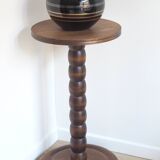 Stele, wooden beaded pedestal table