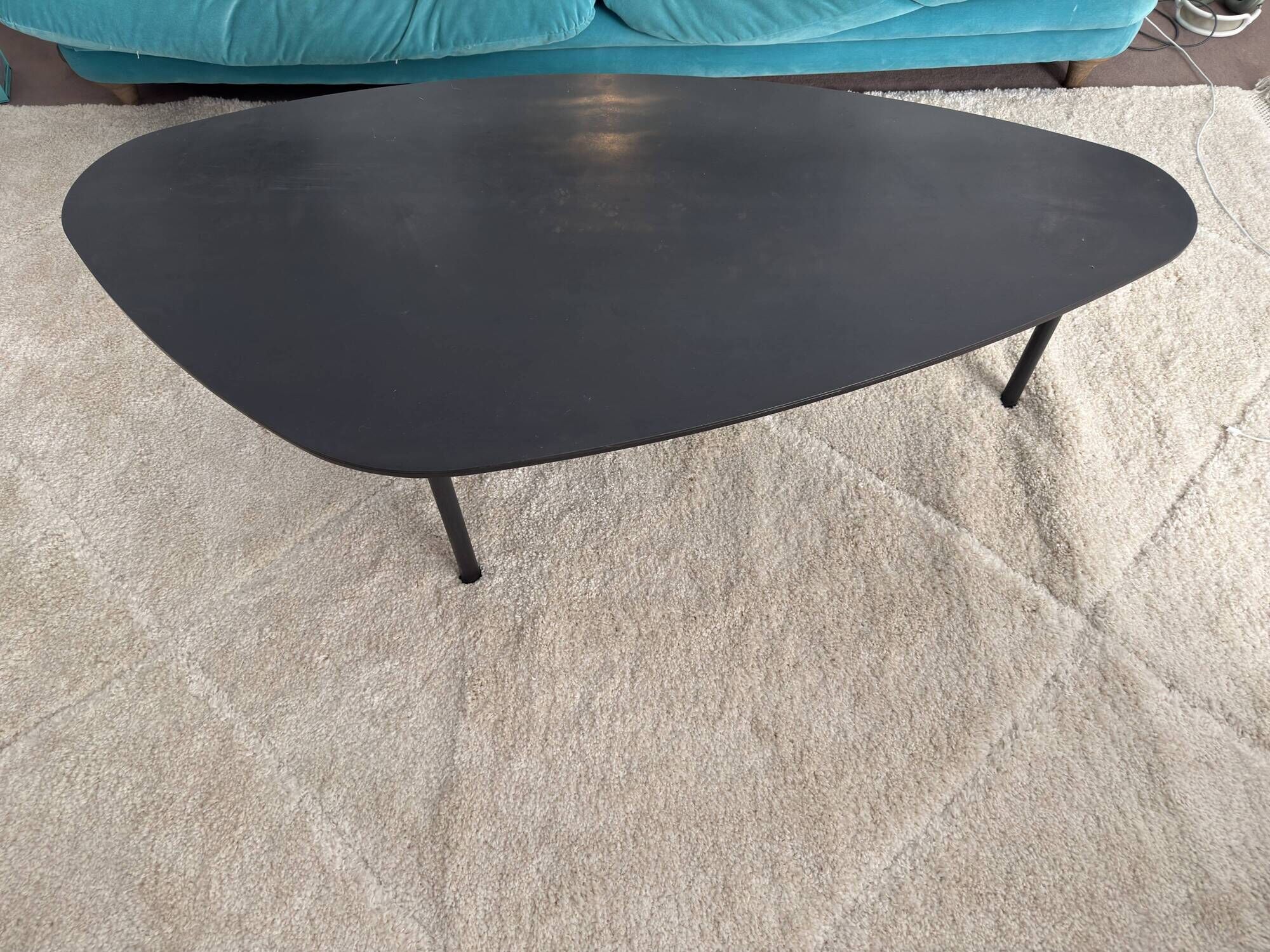 ATOLL table in raw black steel
