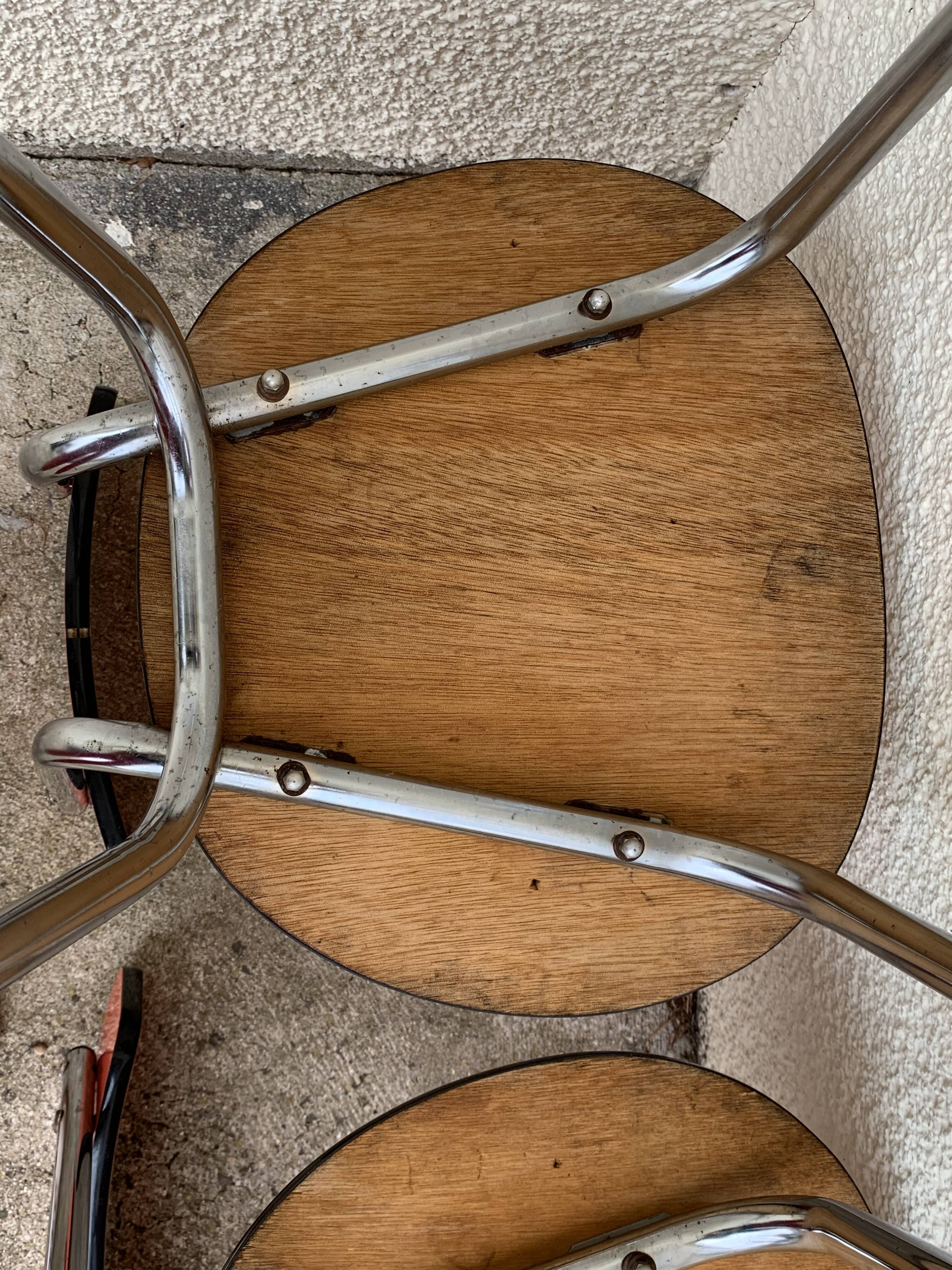 Red formica chairs 1950