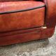 living room in patinated leather and brass from the 80s