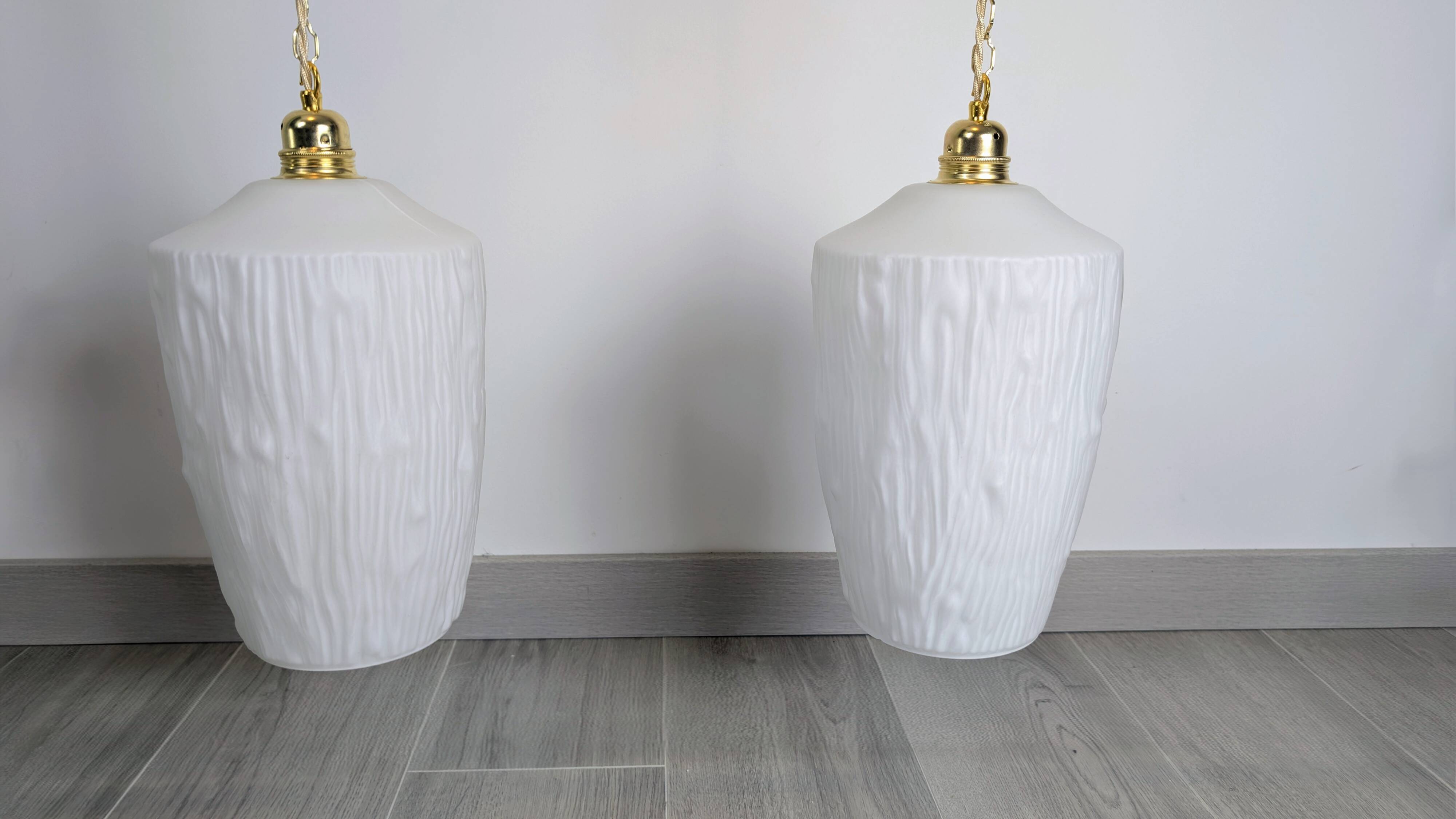 Pair of opaline pendants from the 1960s, luminous simplicity, 140 cm.