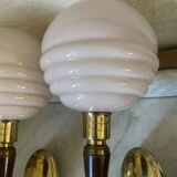 Pair of wall lights in wood, brass, and pink opaline.
