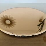 Round beveled amber pink mirror