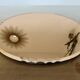 Round beveled amber pink mirror