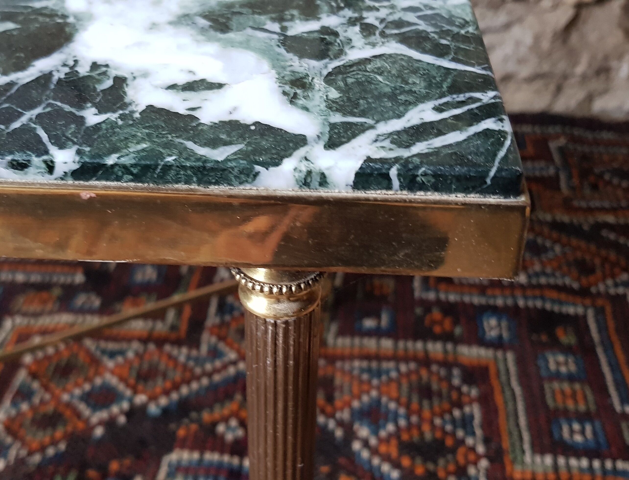 Brass coffee table and green marble