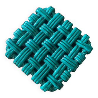 Woven ceramic trivet