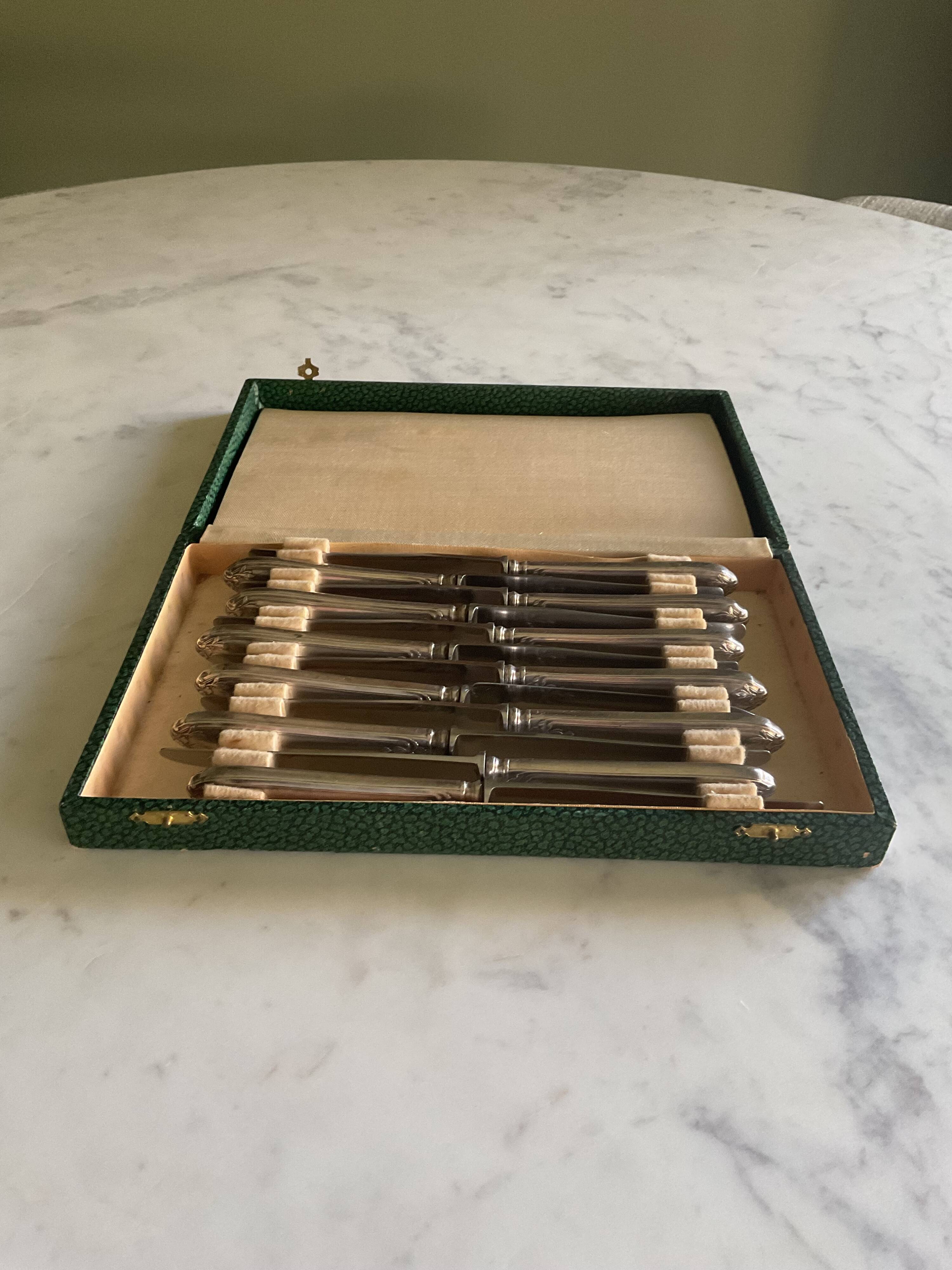 12 silver-plated metal knives. levert silversmith
