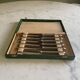 12 silver-plated metal knives. levert silversmith